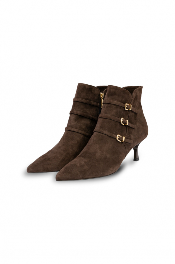 Brown boots with decorative buckles