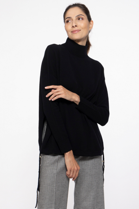 Black turtleneck with a slit on the sides