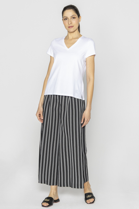 Black trousers with white stripes and a shaped bottom 