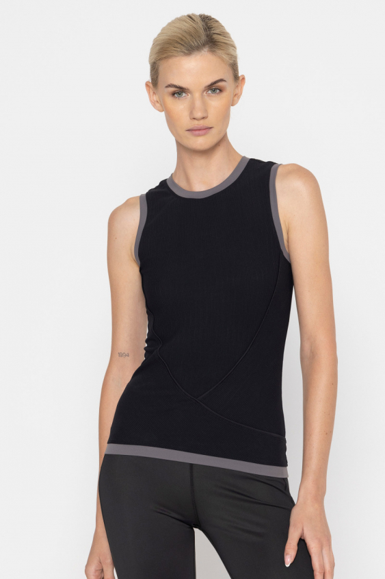 Functional top with contrasting inserts