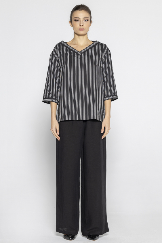 Black blouse with 3/4 length sleeves and white stripes