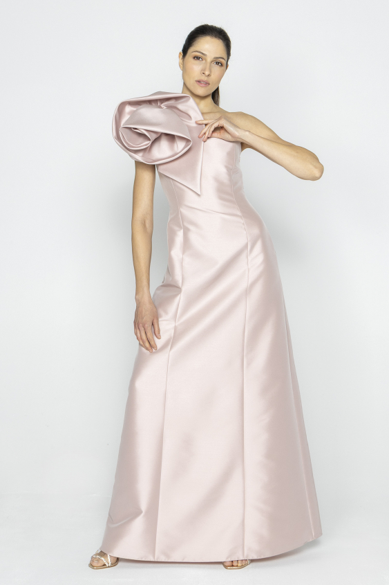 Pink evening dress with a decorative flower