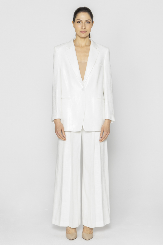 White elegant blazer made of shimmering fabric