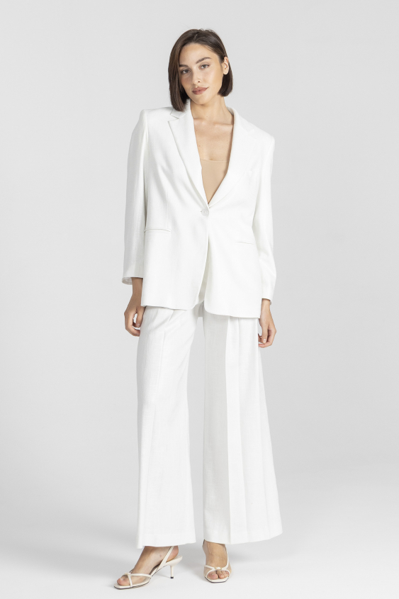 White elegant blazer made of shimmering fabric