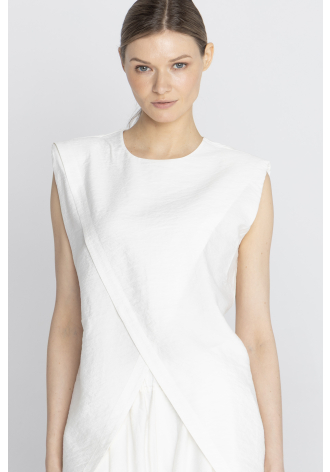 Bluzka bez rękawów w kolorze kremowej bieli