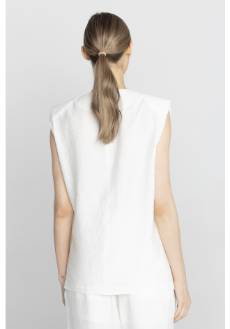 Bluzka bez rękawów w kolorze kremowej bieli