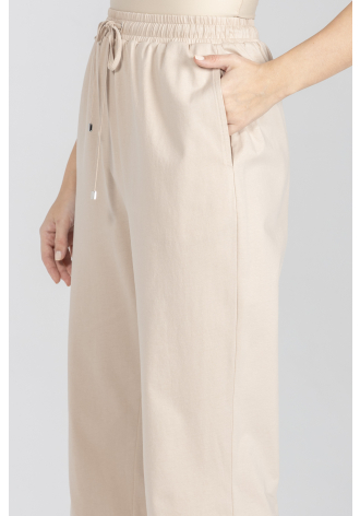 Beżowe dzianinowe spodnie z bawełny