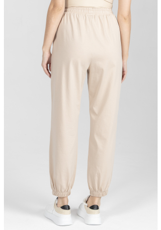 Beżowe dzianinowe spodnie z bawełny