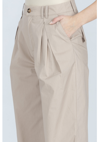 Luźne beżowe spodnie z bawełny