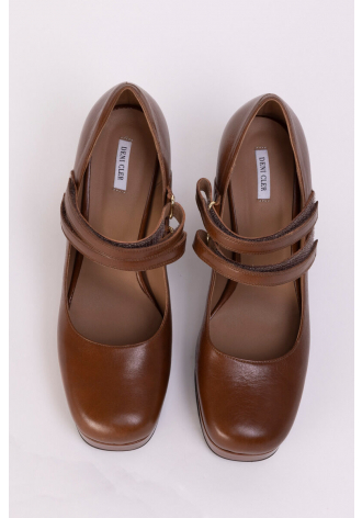 Brown painted loafers with a thick sole and square heels