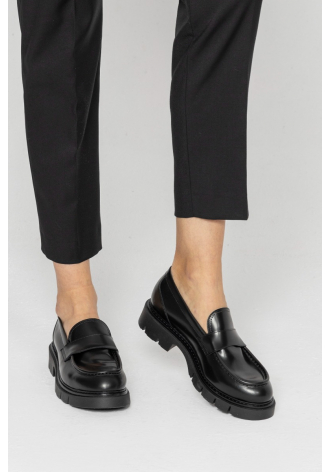 Black moccasins with a thick sole