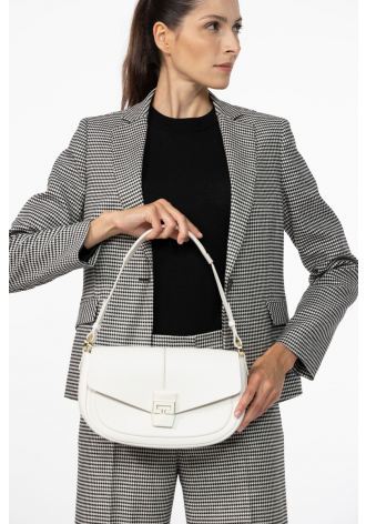 White handbag with decorative clasp  