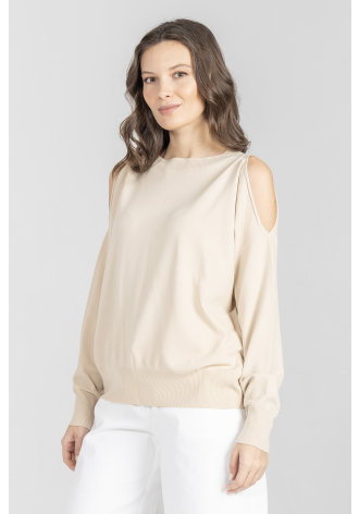 Beżowy sweter z rozcięciami na rękawach