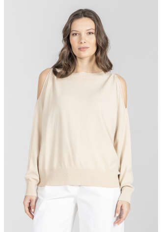 Beżowy sweter z rozcięciami na rękawach