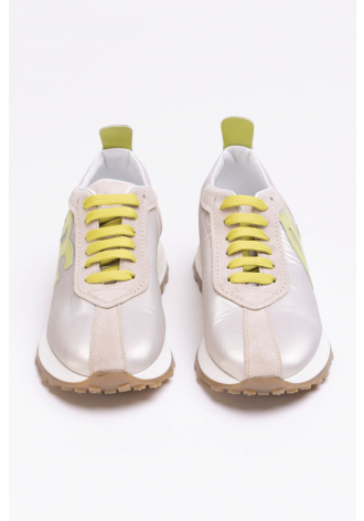  Gold sneakers with contrasting shoelaces