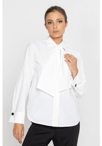 White blouse with a pleat transitioning into a tie 