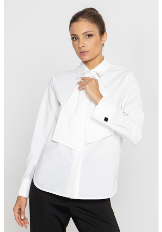 White blouse with a pleat transitioning into a tie 