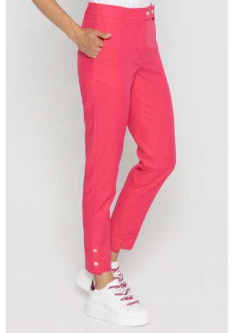 Pink trousers with decorative buttons on the cuffs 