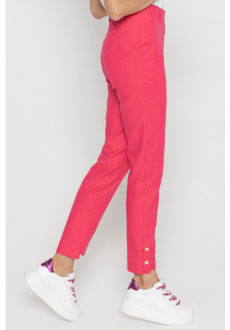 Pink trousers with decorative buttons on the cuffs 