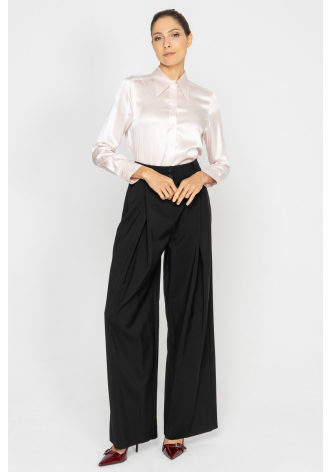 Wide black trousers with a box pleat