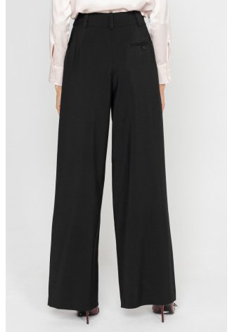 Wide black trousers with a box pleat