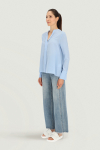  Blue long-sleeved blouse
