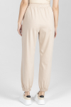 Beżowe dzianinowe spodnie z bawełny