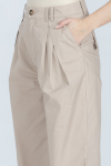 Luźne beżowe spodnie z bawełny