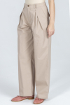 Luźne beżowe spodnie z bawełny