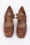 Brown painted loafers with a thick sole and square heels