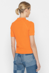 Pomarańczowy sweter w stylu polo