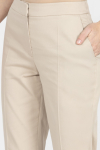 Wąskie beżowe spodnie 