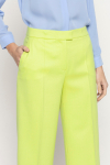 Wide lime-coloured trousers