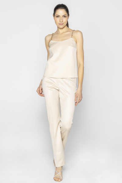 Beige top with decorative straps