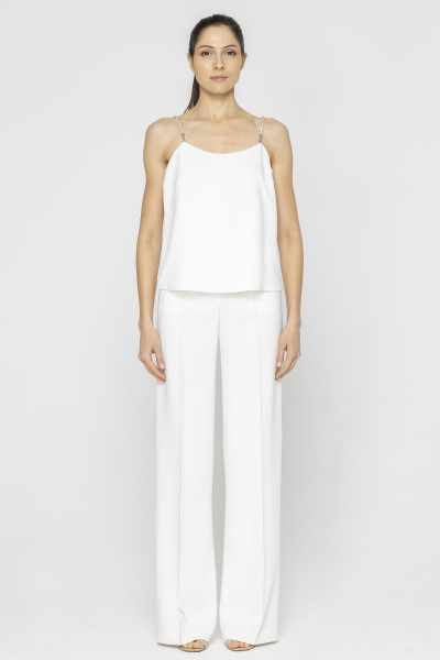 White top with decorative straps